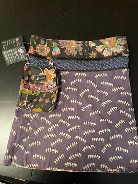 REVERSIBLE and EXTENDABLE with  DETACHABLE crossbody pouch.